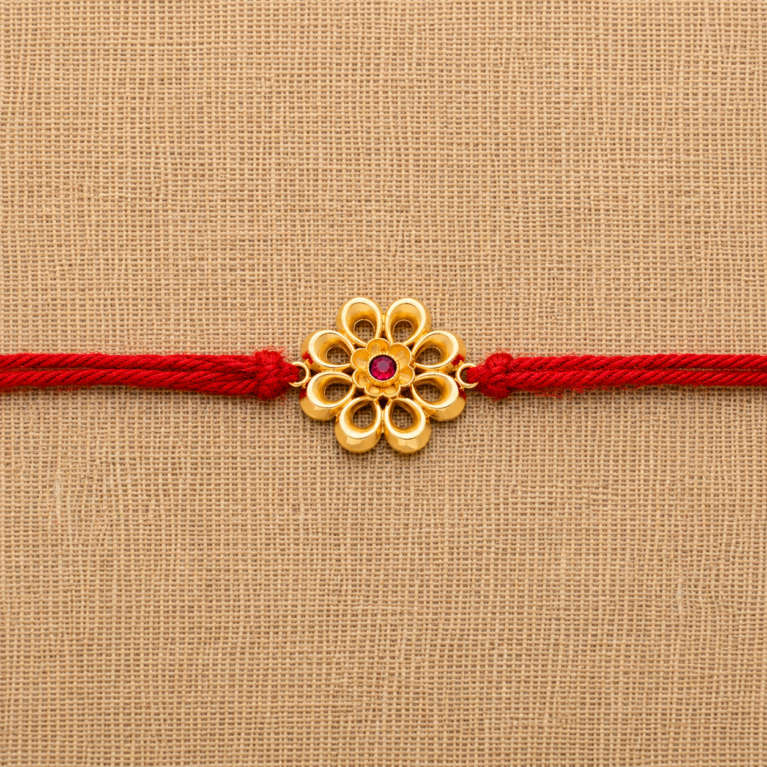 22k-gold-floral-rakhi-red-thread