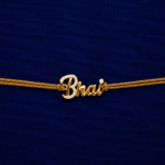 Gold Finish Bhai Name Rakhi with sparkling stones and golden thread