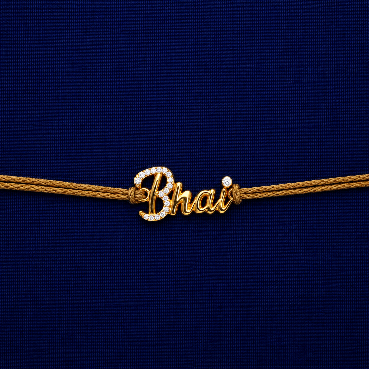 Gold Finish Bhai Name Rakhi with sparkling stones and golden thread