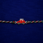Bro Car Rakhi featuring a red car charm with premium multicolor thread