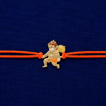Bal Hanuman gold finish rakhi with premium orange thread for kids