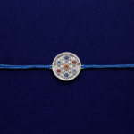 Silver rakhi with premium blue thread and circular designer charm