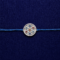 Silver rakhi with premium blue thread and circular designer charm