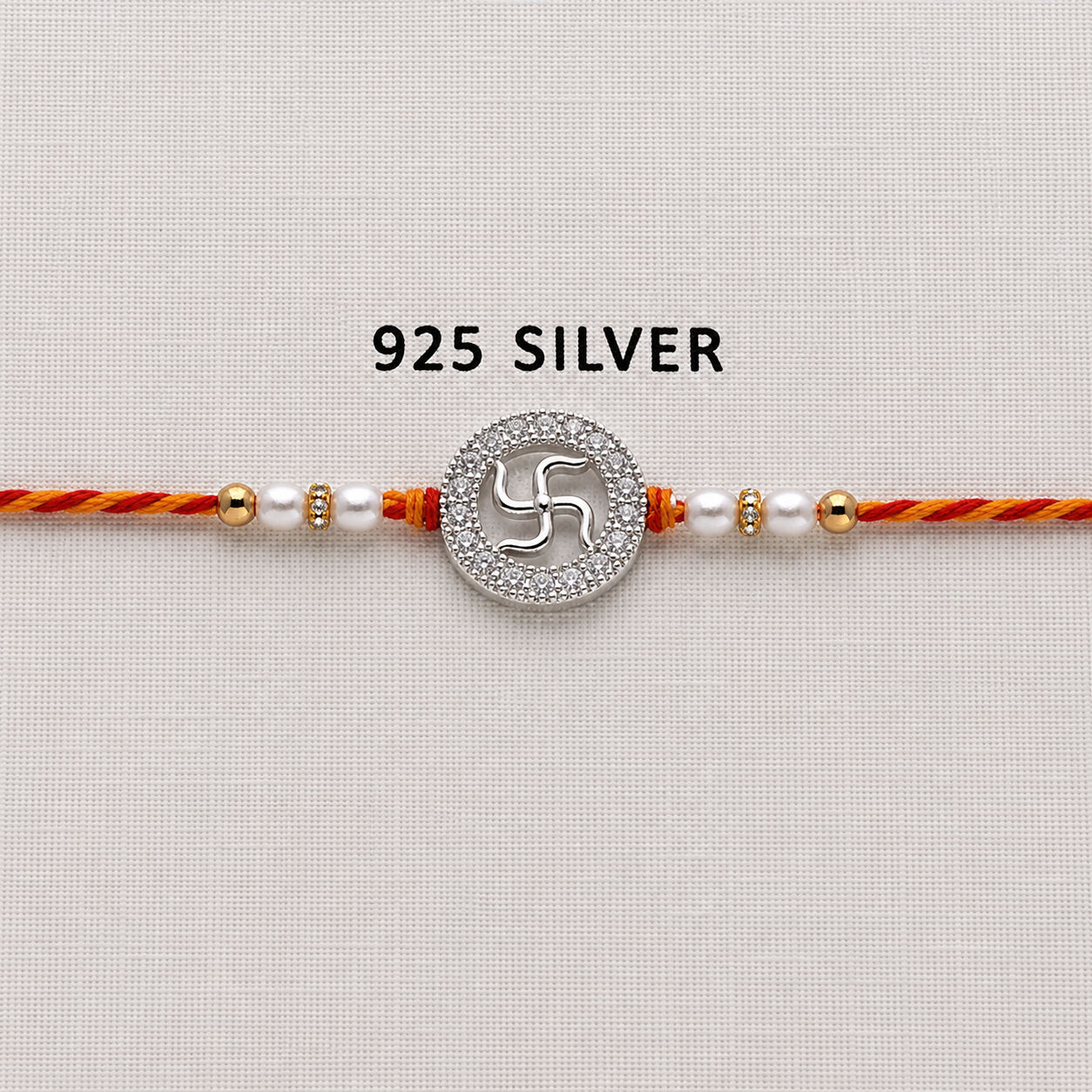 925 Silver Swastik Rakhi with CZ Stones, Pearl Beads and Traditional Red-Orange Thread